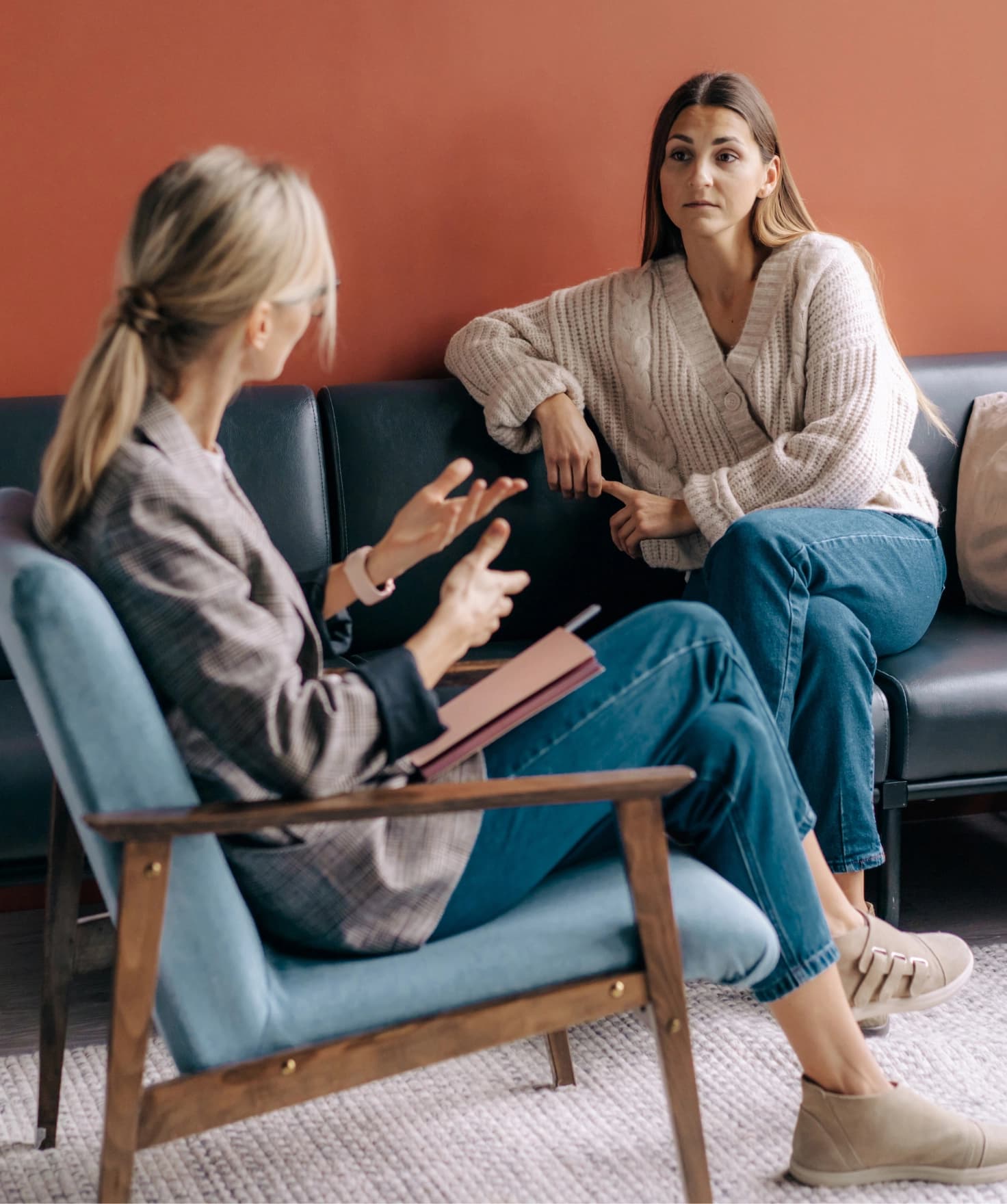 Therapist reviewing Auralink Pro insights before a session